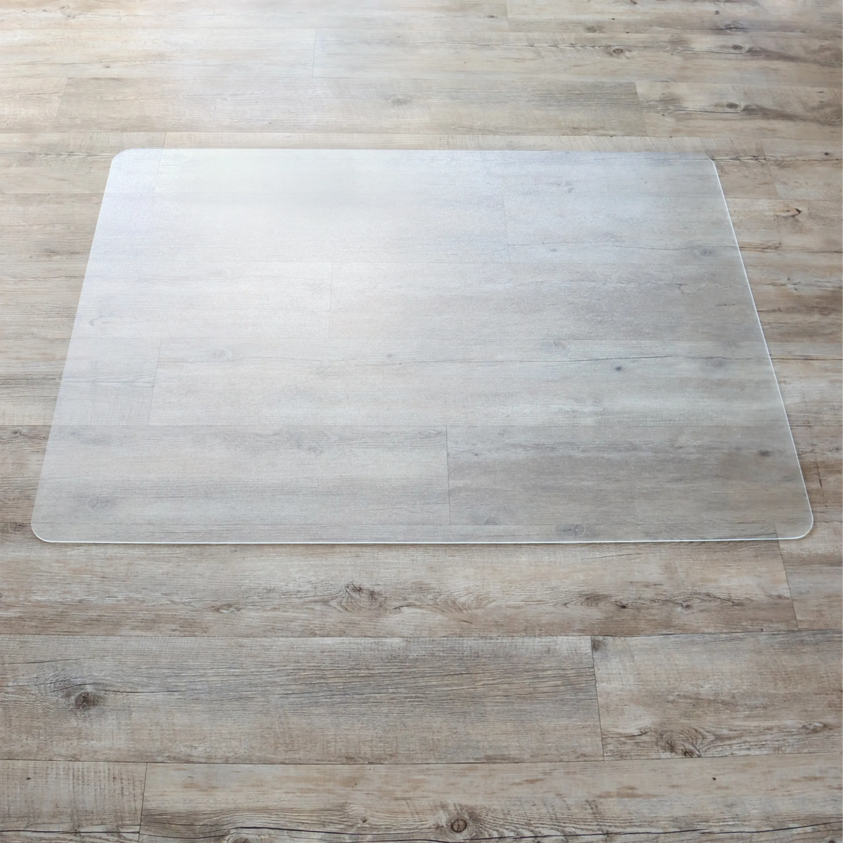 Genomskinlig Skyddsmatta PUNOMAT för hårda golv i formatet 120 x 90 cm från Kottig