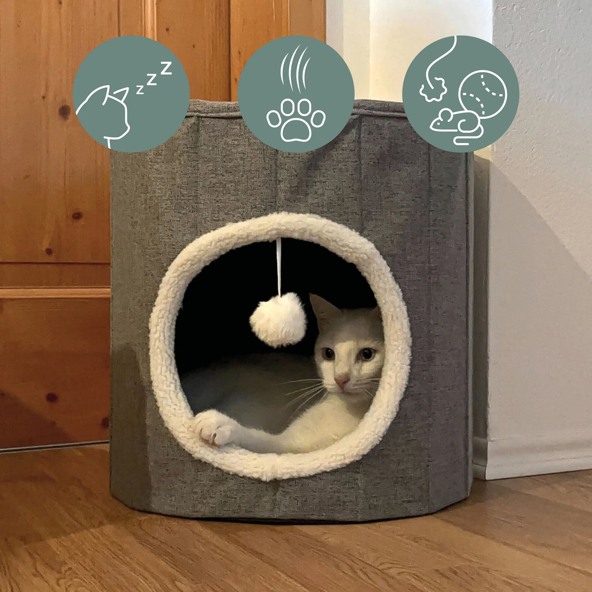 Grå PAWY R kattgrotta med vit pälskant, integrerad lekboll och en katt inuti från hjh LIVING