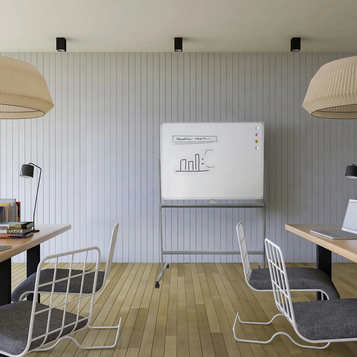 Whiteboard MULTIBOARD I i vitt och silver på ett stativ med hjul i ett modernt kontorsrum från hjh OFFICE