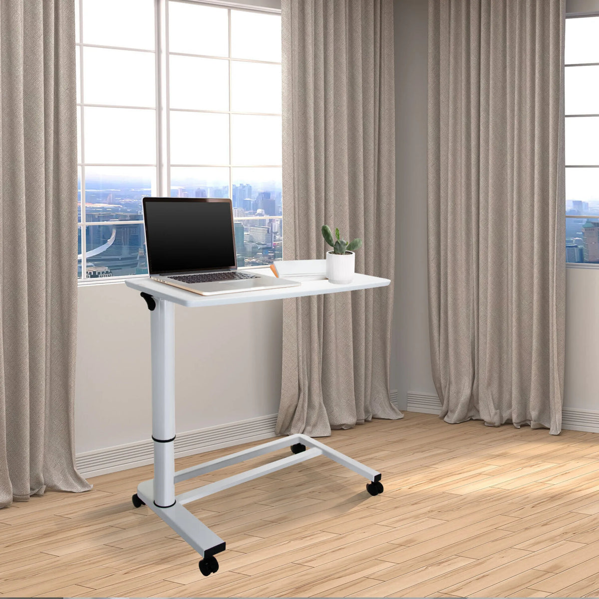 Vitt Ståskrivbord STAND II med hjul och laptop på ett ljust trägolv från hjh OFFICE