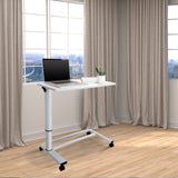 Vitt Ståskrivbord STAND II med hjul och laptop på ett ljust trägolv från hjh OFFICE