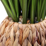 Flätad kruka med små stenar och gröna blad från de Konstgjorda växter CORTADERIA från hjh OFFICE