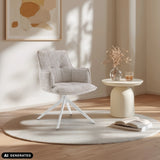 Beige Tavaro matstol med vit stjärnfot på en rund matta från hjh LIVING (AI-genererad bild)