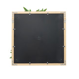 Baksidan av den kvadratiska Växtmatta LEAFLUXE WALL 1 i svart med metalldetaljer från hjh LIVING