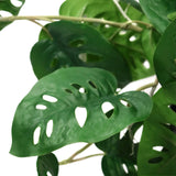 Gröna blad från de Konstgjorda växter MONSTERA CLIMB med karakteristiska hål från hjh OFFICE