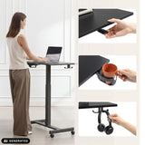 Svart Stand K ståskrivbord med mugghållare och hörlurskrok från hjh OFFICE (AI-genererad bild)