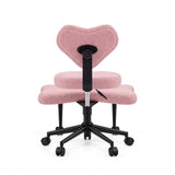 Baksidan av den rosa Asanasit meditationsstolen med hjärtformat ryggstöd och svart korsfot från hjh LIVING