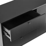 Geöffneter Schubladenauszug des Sideboards KARBY S in Schwarz mit geriffelter Front von hjh LIVING