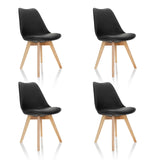 Set om fyra svarta SCANDI 4 skålformade stolar med ljusa träben från hjh OFFICE