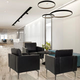 Tre svarta BAVERO Loungefåtöljer i konstläder i en modern kontorslounge från hjh OFFICE