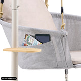 Sidficka med surfplatta och tidning på Skylo hängstol inklusive ett litet sidobord från hjh LIVING (AI-genererad bild)