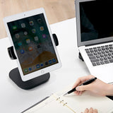 Svart Hållare för mobiltelefon & surfplatta FLEXMOBI IV med en insatt surfplatta på ett vitt skrivbord från hjh OFFICE