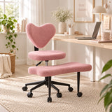 Rosa Asanasit meditationsstol med hjärtformat ryggstöd och fotstöd framför ett skrivbord från hjh LIVING